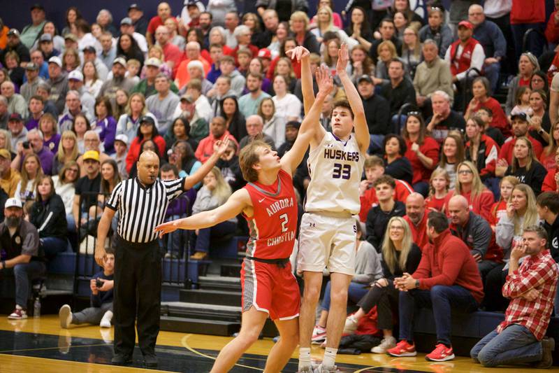 Serena senior Hunter Staton shoots a 3-pointer against Aurora Christian during the Class 1A Harvest Christian Sectional championship game Friday, March 1, 2024, in Elgin.