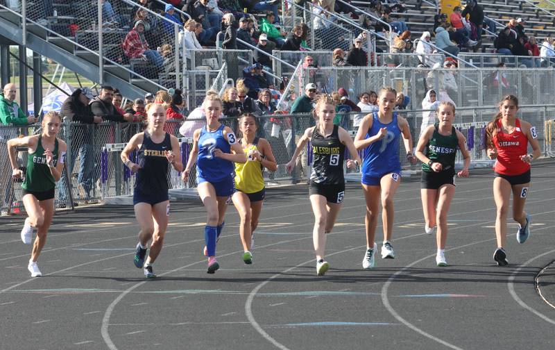 Teams compete in the 3200 meter run during the Class 2A Sectional track meet on Wednesday, May 13, 2026 in the Jeff Prusator Athletic Complex at Mendota High School.