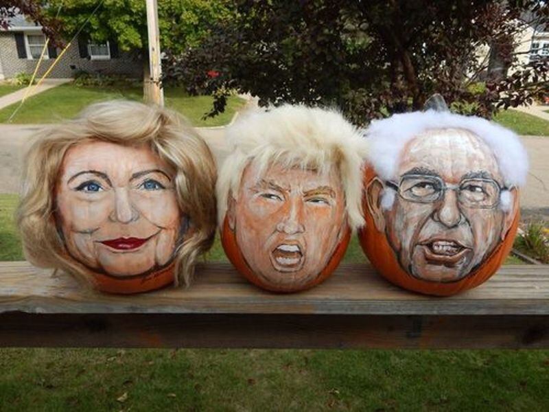 Pop artist John Kettman, of La Salle and formerly of Streator, shows off his presidential pumpkins from his deck: (from left) Hillary Rodham "Pumpkin," the "Trumpkin," and Bernie Sanders pumpkin.