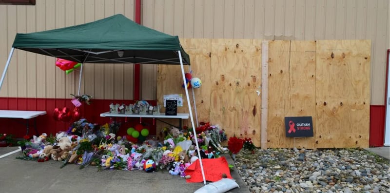 A memorial was set up at the site where three children and a teen died when a Jeep crashed through a building that housed an after-school program in Chatham in April. A fourth child has since died on Monday.