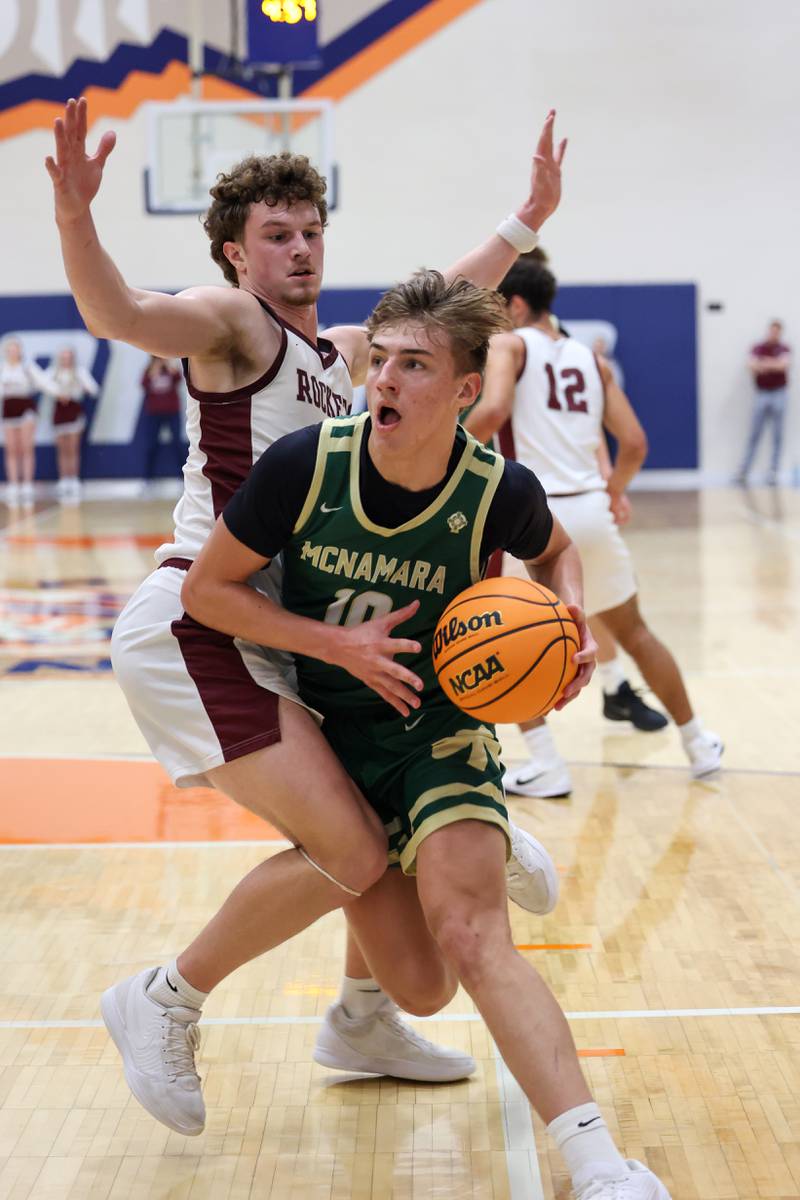Bishop McNamara's Coen Demack drives to the basket during the Fightin' Irish's 77-70 loss to Tolono Unity in the IHSA Class 2A Pontiac Supersectional on Monday, March 9, 2026.
