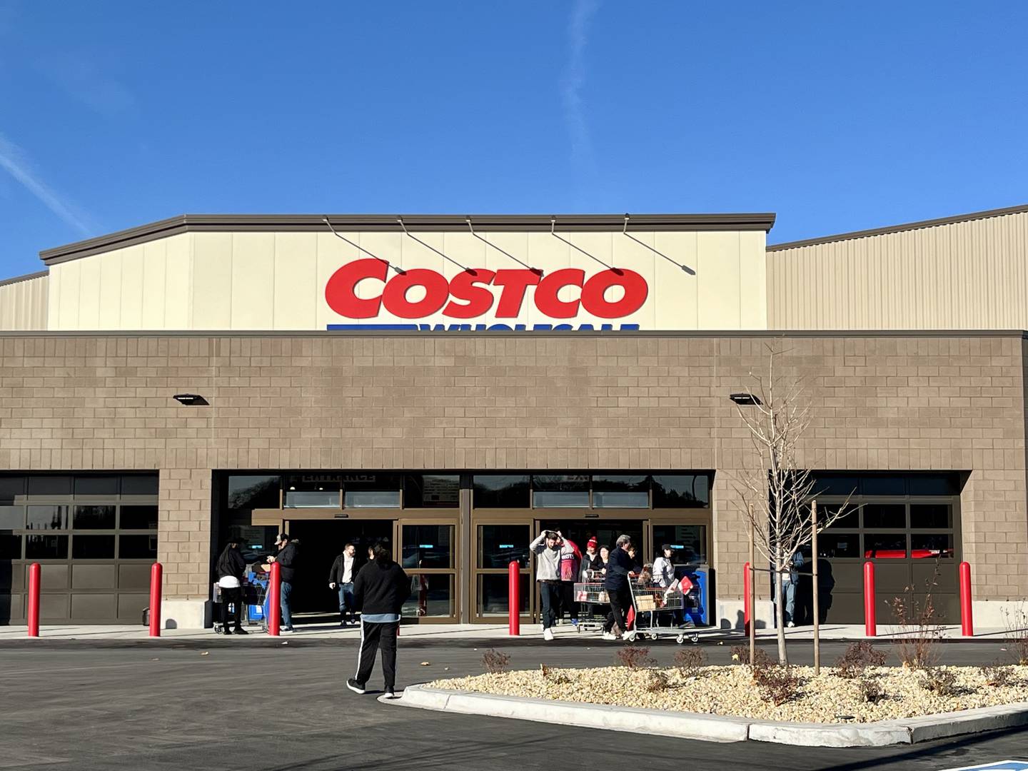 Shoppers pour in and out of the new Costco location in Yorkville on Nov. 12, 2025.