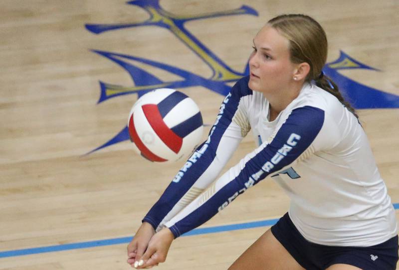 Marquette's Taylor Gamons returns a serve from Newark on Wednesday, Aug. 27, 2025 in Bader Gymnasium.