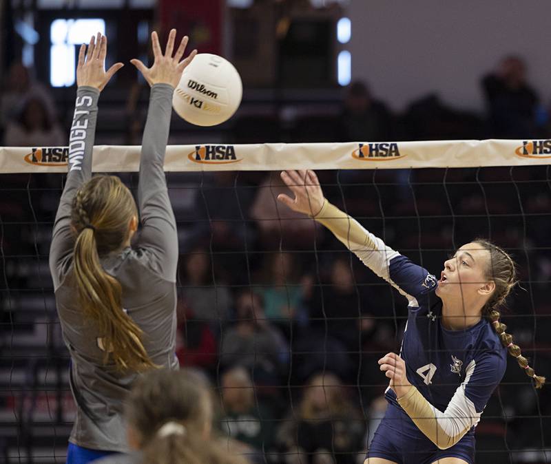 IC Catholic’s Ava Falduto hammers a shot Friday, Nov. 11, 2022 during a class 2A semifinal volleyball game Friday, Nov. 11, 2022 against Freeburg.