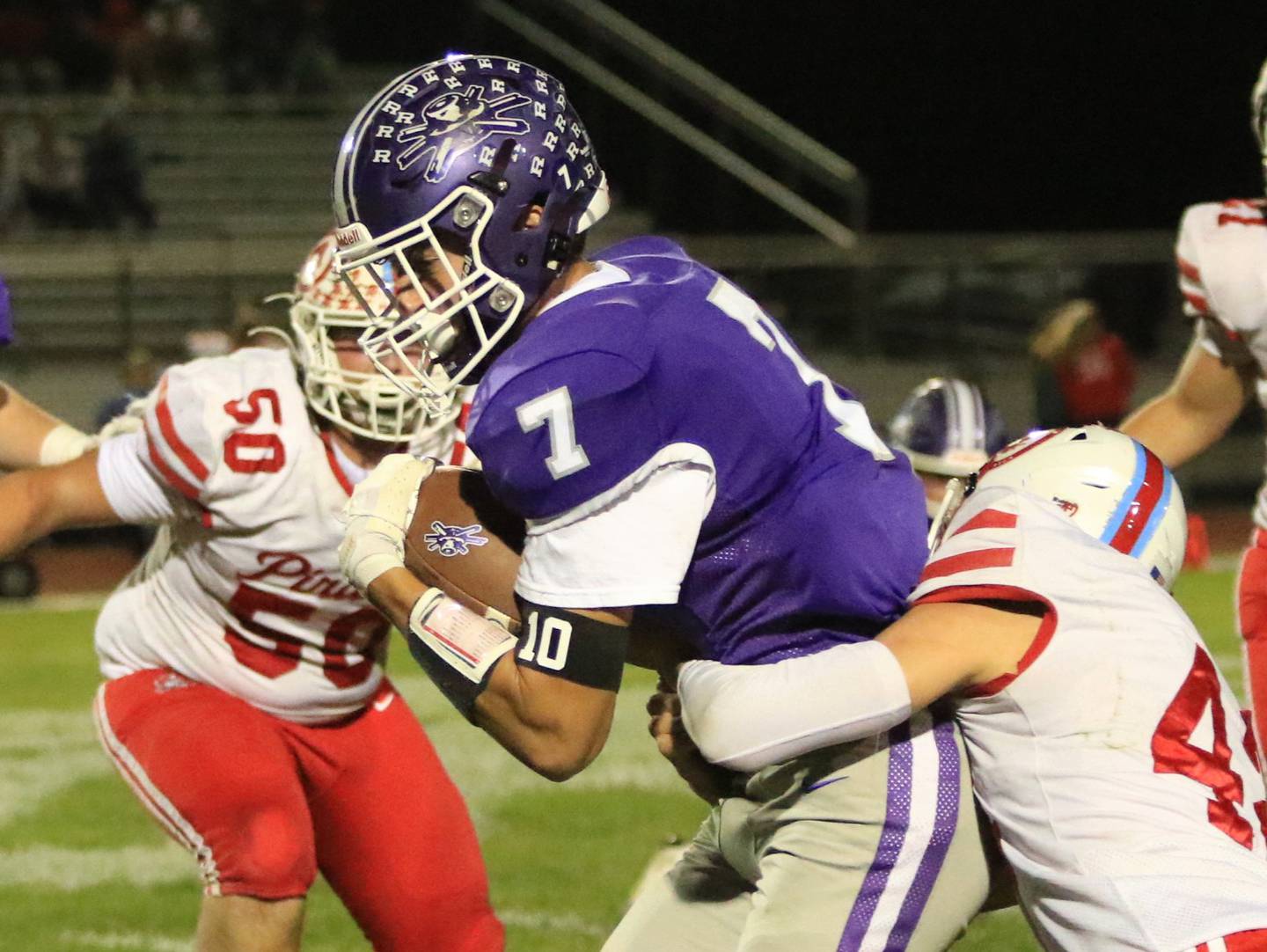 Rochelle's Mark Green goes for extra yards during the Hubs' game with Ottawa on Friday.