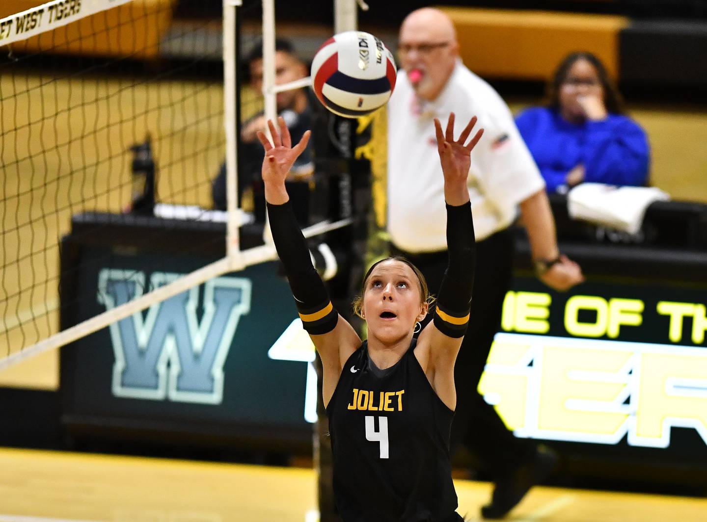 Joliet West's Lina Govoni (4) set's the ball during Joliet West Class 4A Regional Championship game against Romeoville on Thursday, Oct 31, 2024 at Joliet. (Dean Reid for Shaw Local News)