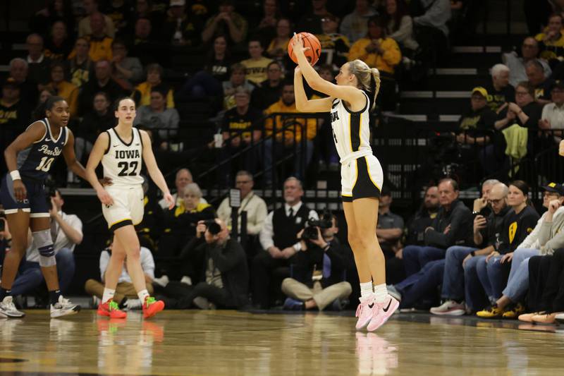 Iowa Hawkeyes guard Kylie Feuerbach (4) shoots during their game against Penn State at Carver-Hawkeye Arena in Iowa City, IA on Thursday, February 8, 2024. (Owen Aanestad/hawkeyesports.com)