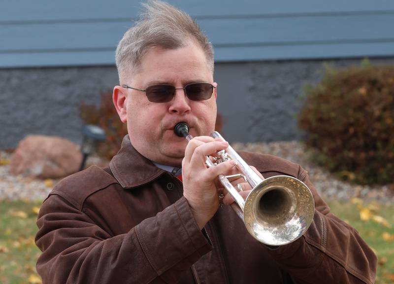 Hall High School band director Brandon Czubachowski, plays Taps to commemorate the fallen 24 soldiers who attended Hall High School that died in WWII during the Veterans Day program on Tuesday, Nov. 11, 2025 in the Hall High School
