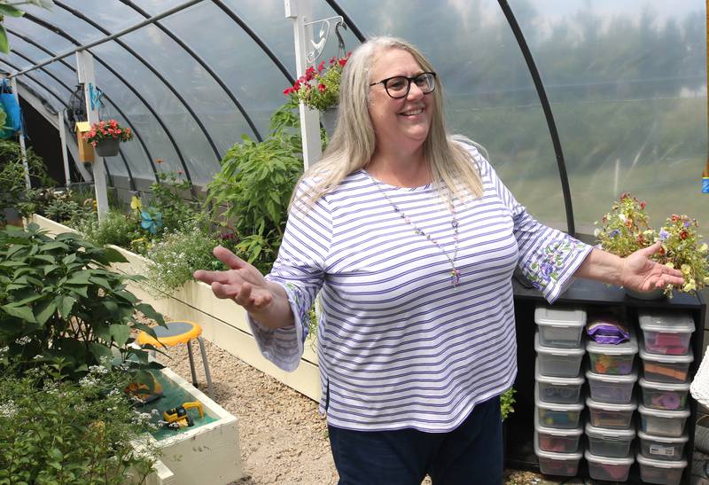 Tammy McMahan, founder and executive director of the Ruth Project, talks Thursday, July 13, 2023, in the greenhouse at the organization’s 33-acre farm in Sycamore. The Ruth Project is a group based in Elgin that provides support for foster parents and children.