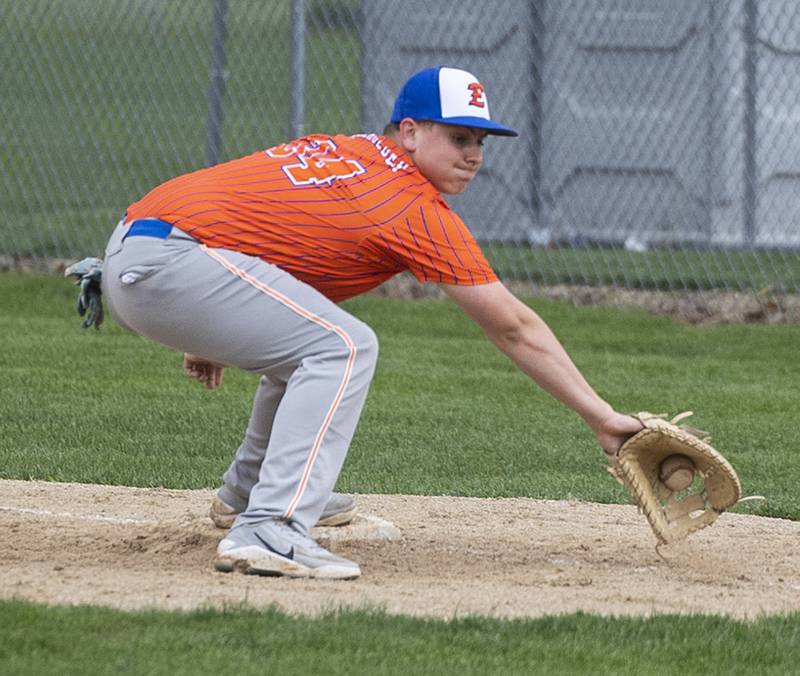 Eastland’s Ian Burkholder digs a throw for an out against Newman Wednesday, April 15, 2026.