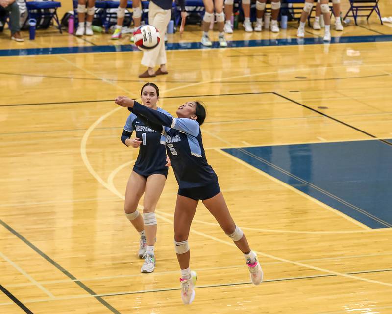 Downers Grove South's Alex Barcenas (5) bumps the ball during Class 4A Riverside-Brookfield Supersectional match between Lockport at Downers Grove South.  Nov 11, 2024  in Riverside.