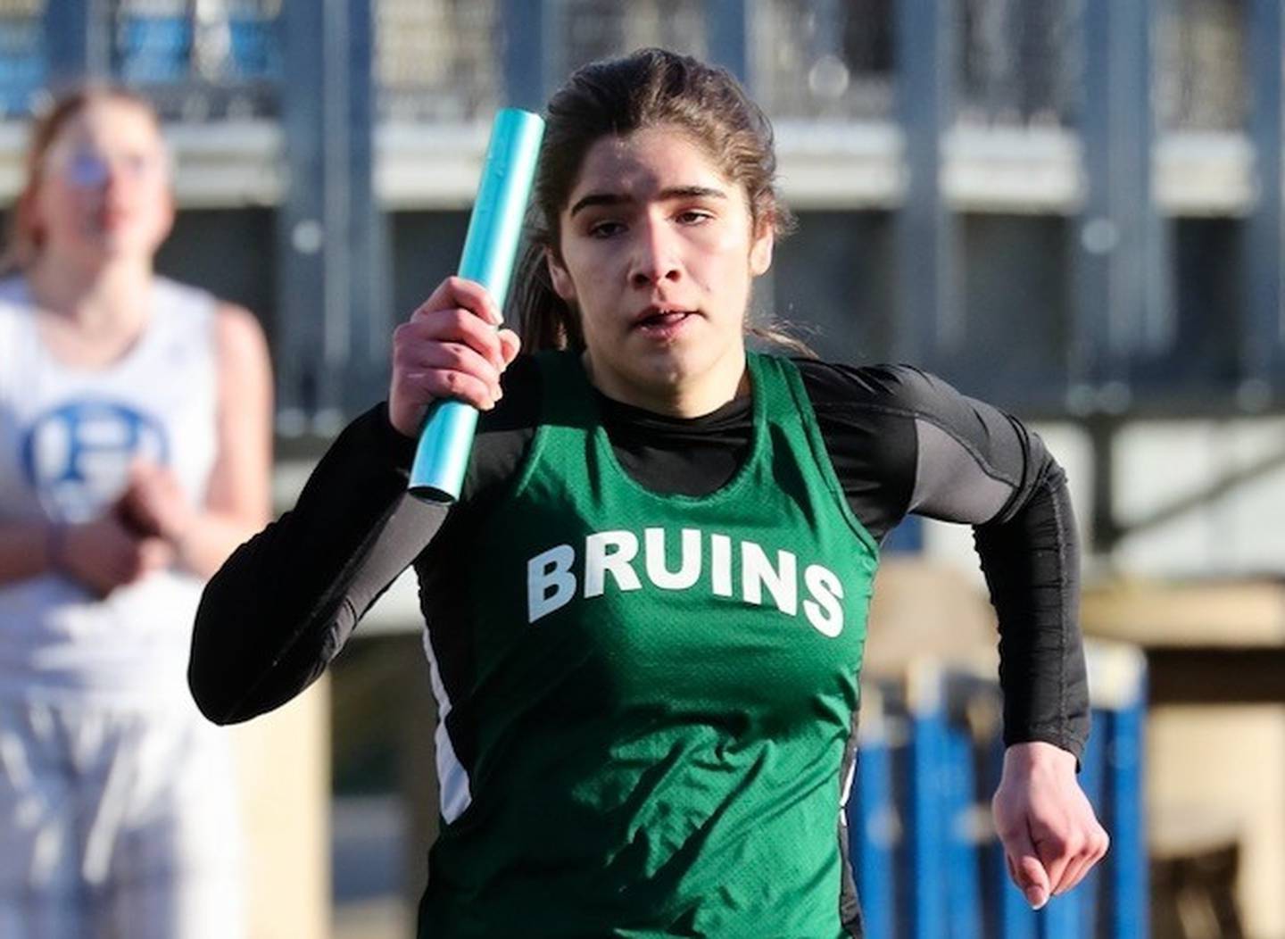 St. Bede's Lily Bosnich runs a relay in Thursday's Howard-Monier Girls Invitational at Princeton.