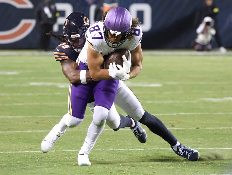 Chicago Bears linebacker Tremaine Edmunds brings down Minnesota Vikings tight end T.J. Hockenson during their game Monday, Sept. 8, 2025, at Soldier Field in Chicago.