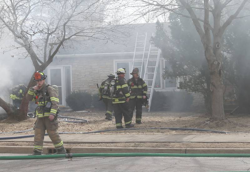 Firefighters work the scene of a garage fire in the 1900 block of Shooting Park Road on Monday, Feb. 9, 2026 in Peru. La Salle, Peru, Utica, Oglesby and Spring Valley fire departments were dispatched around 12:15p.m. to the fire.