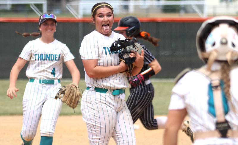Woodstock North’s Kylee Nicholson, center, and the Thunder celebrate the final out of a 5-2 win over Crystal Lake Central in IHSA Class 3A Regional Title Game softball action on Saturday, May 23, 2026 at Crystal Lake Central High School in Crystal Lake.