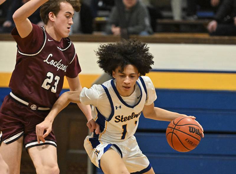 Joliet Central's Zion Kostyra drives to the basket against Lockport on Monday, Jan. 30, 2023, at Joliet.