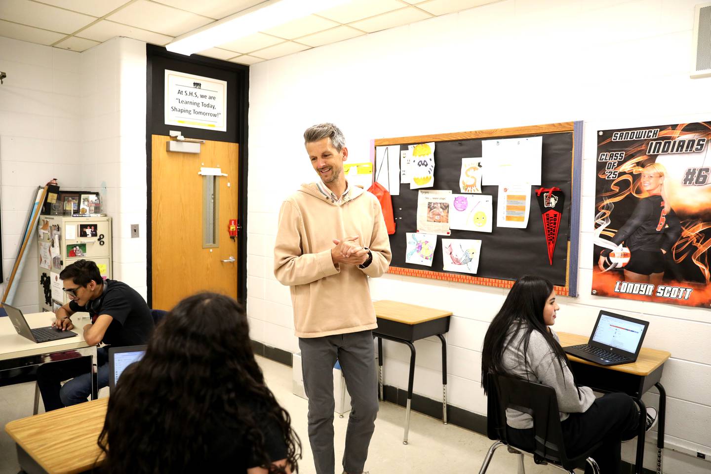 Sandwich High School multilingual teacher Brian Long also coaches track and cross country at the school.