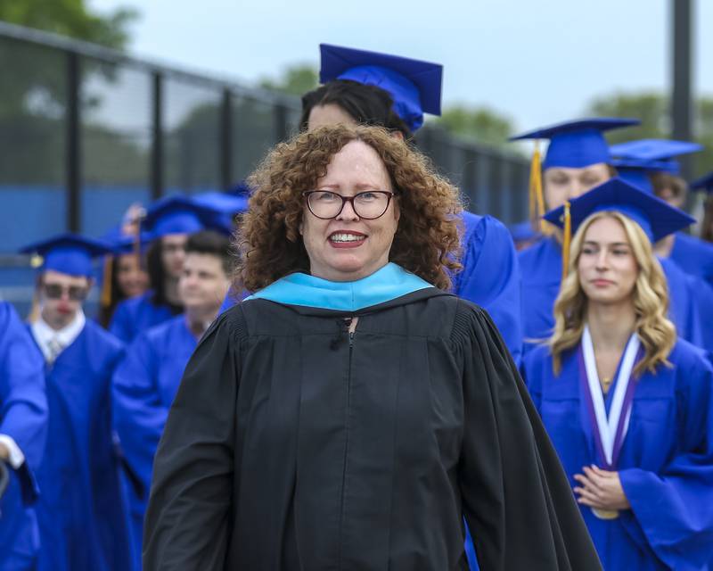 The school faculty leads the students onto the field at the Lyons Township High School Graduation ceremony Wednesday, May 28, 2025  in Western Springs.