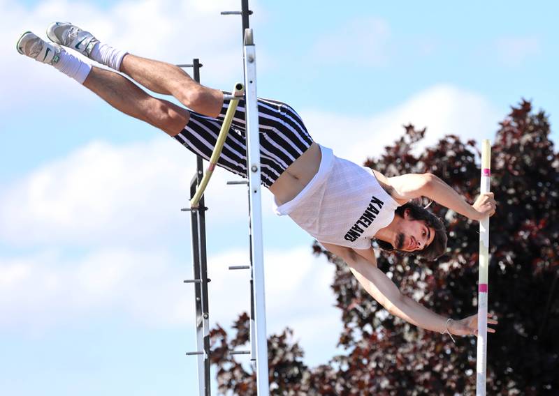 Kaneland’s Trevor Meagher clears the bar in the pole vault Wednesday, May 20, 2026, during the Class 2A boys track sectional at Rochelle High School.
