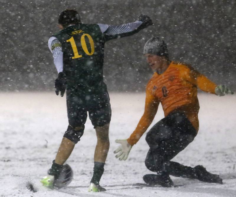 Timothy Christian's Peter Buikema goes after the ball as Crystal Lake South's Nolan Getzinger takes a shot during the IHSA Class 2A Grayslake Central Supersectional soccer match on Tuesday, Oct. 31, 2023, at Grayslake Central High School.