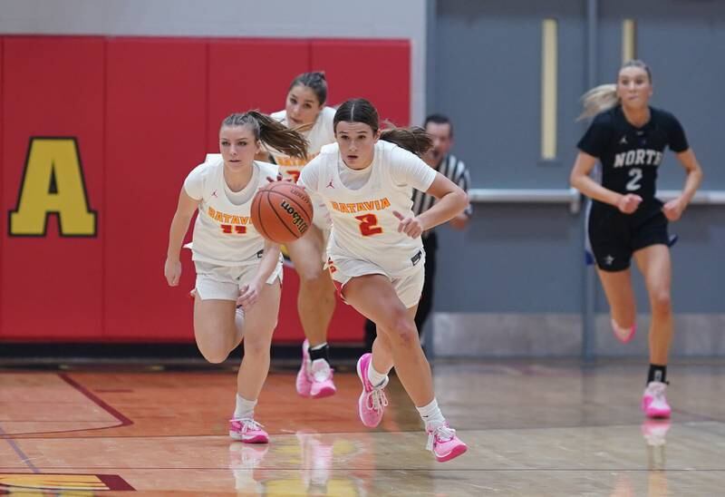 Batavia's Brooke Carlson (2) brings the ball up the court after a steal against St. Charles North during a basketball game at Batavia High School on Tuesday, Dec 5, 2023.