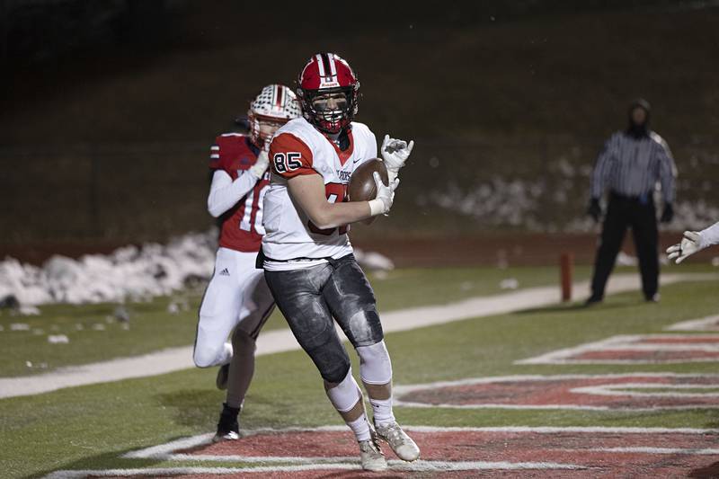 Amboy’s Brennan Blaine hauls in a touchdown for the Clippers’ first of the game Friday, Nov. 18, 2022 in the 8-man championship football game against West Central.