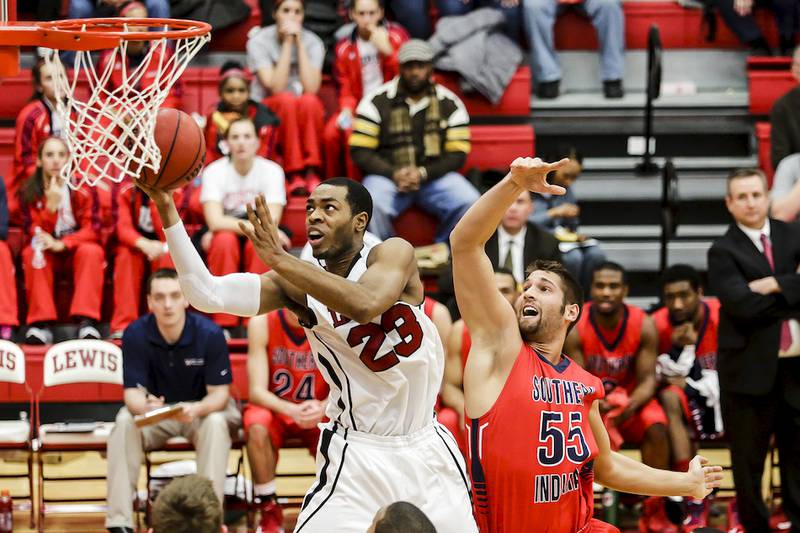 Lewis University's Julian Lewis goes up for a layup during the first half of  Thursday's game against Southern Indiana in Romeoville. Lewis defeated Southern Indiana, 73-63.