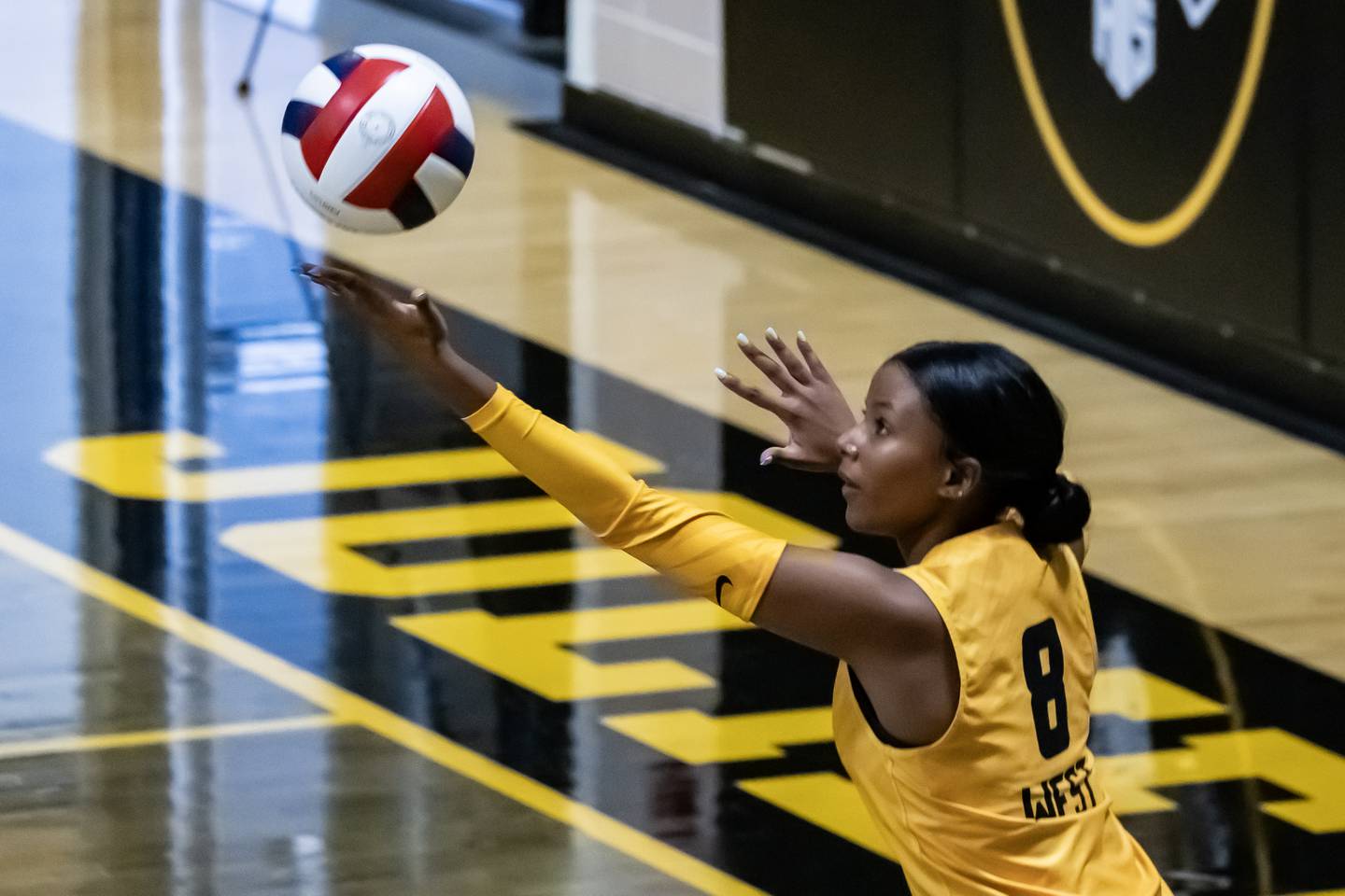 Joliet West's Eden Eyassu serves during a varsity volleyball home game against Joliet Catholic on Sept. 4, 2025.