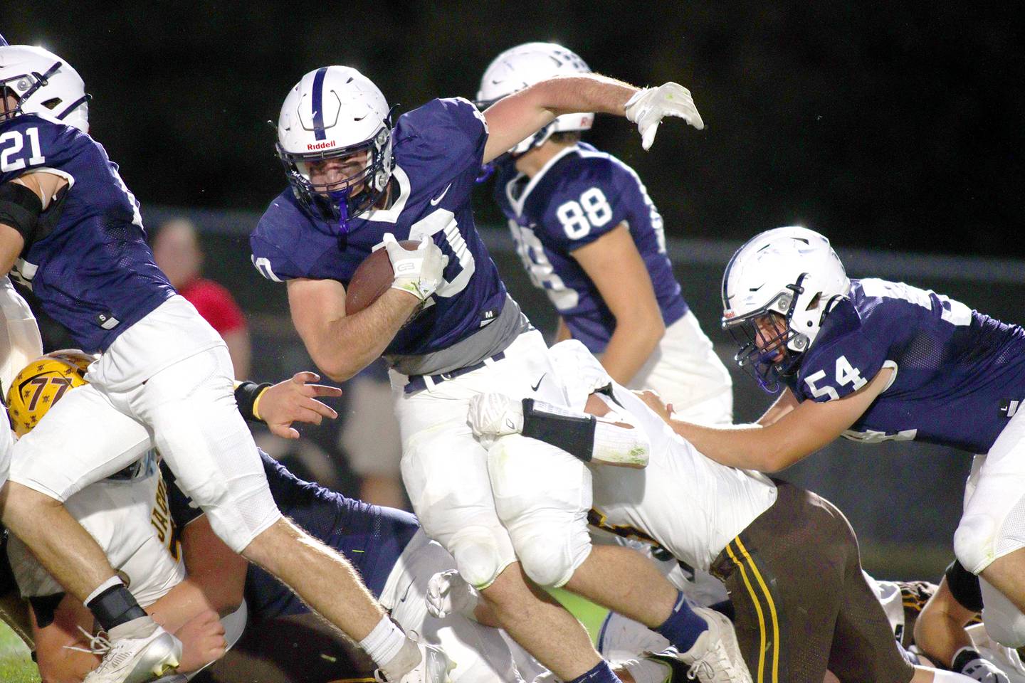 Cary-Grove’s Logan Abrams runs the ball against Jacobs in varsity football on Friday, Sept. 20, 2024, at Al Bohrer Field on the campus of Cary-Grove High School in Cary.