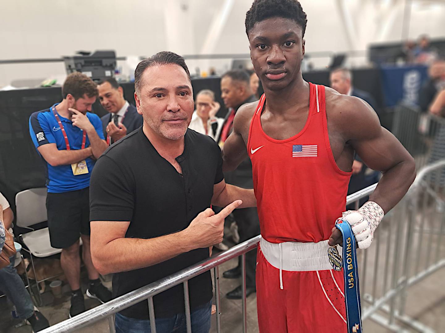 Former world champion Oscar De La Hoya (left) poses with JoJo Awinongya at the USA Boxing National Junior Olympics and Summer Festival in Las Vegas.