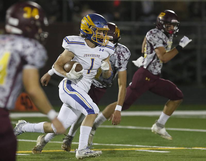 Johnsburg's Jake Metze runs for a touchdown after catching a pass during a Kishwaukee River Conference football game Friday, Oct. 7, 2022, between Richmond-Burton and Johnsburg at Richmond-Burton Community High School in Richmond.
