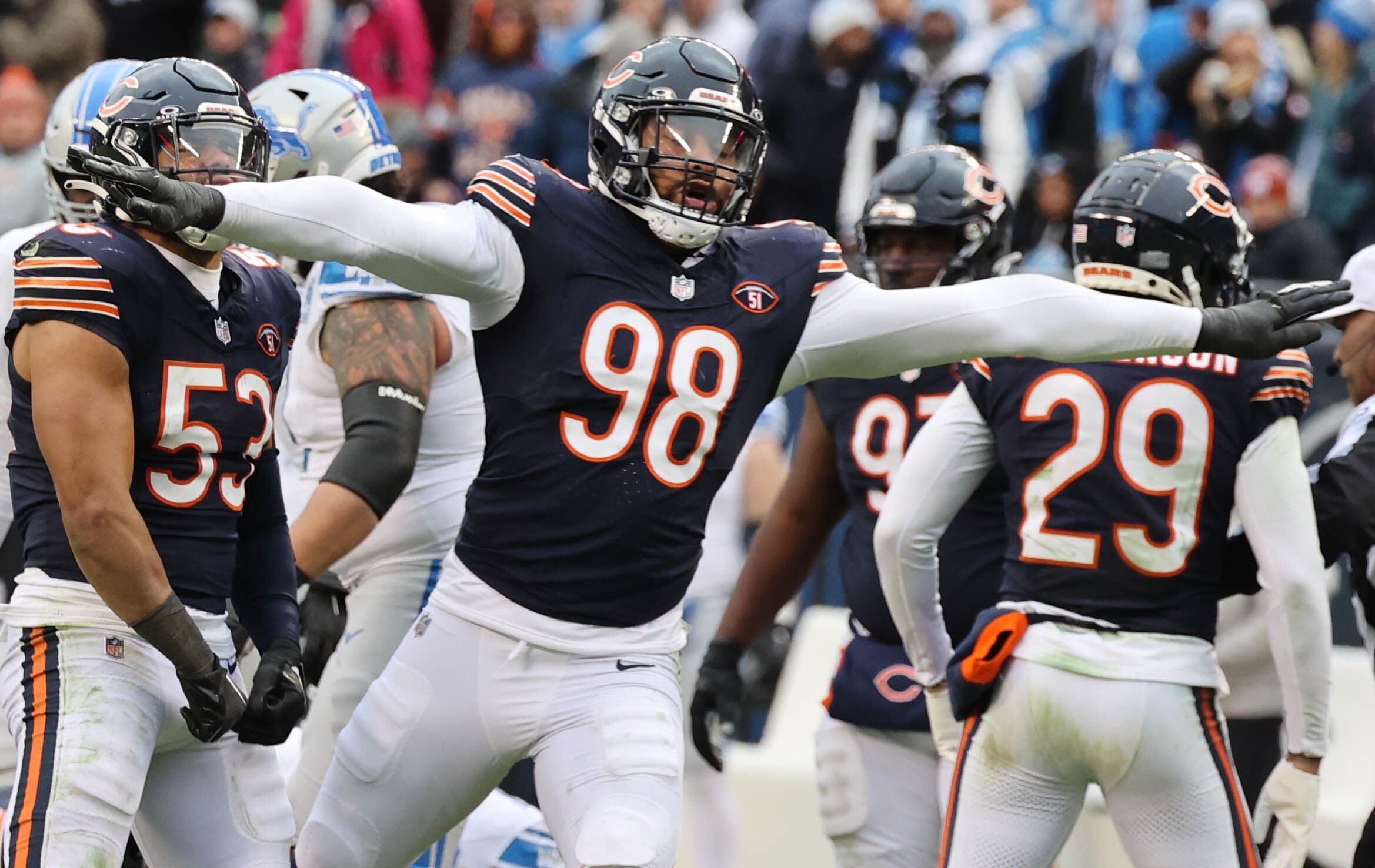 Chicago Bears defensive end Montez Sweat celebrates after stopping the Detroit Lions on fourth down late in their game Sunday at Soldier Field in Chicago.