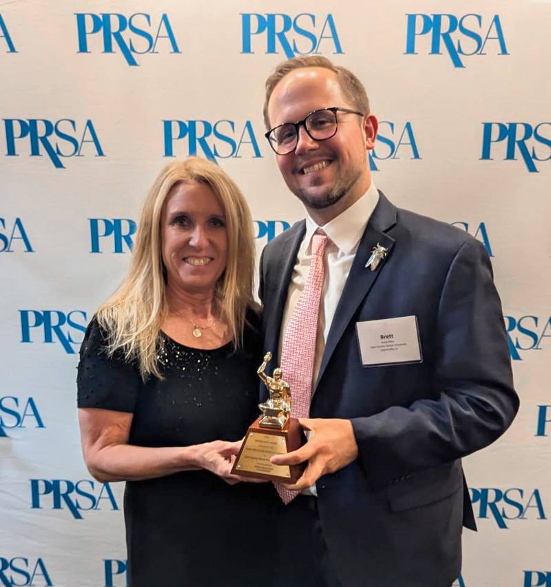 Kim Mikus, media and community relations specialist, and Environmental Communications Specialist Bret Peto accepted a top international honor for the 2024 Celebrating Cicadas communications campaign.