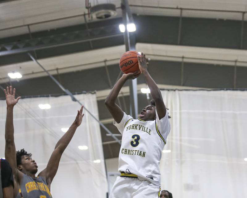 Yorkville Christian's Jayden Riley (3) rises up to shoot a jump shot during their basketball game between Christ the King at Yorkville Christian, Feb 6, 2026 in Yorkville.