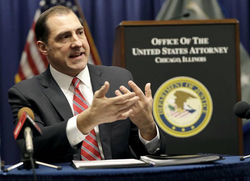 John R. Lausch Jr., the new U.S. attorney for the Northern District of Illinois, responds to a question during a meeting with reporters for the first time Wednesday, Jan. 24, 2018, in Chicago. Lausch says President Donald Trump never tried to speak to him before the president nominated him for the position and told reporters on Wednesday, that he has still not spoken to the president and has not been given any instructions by Attorney General Jeff Sessions to change the priorities of the office.