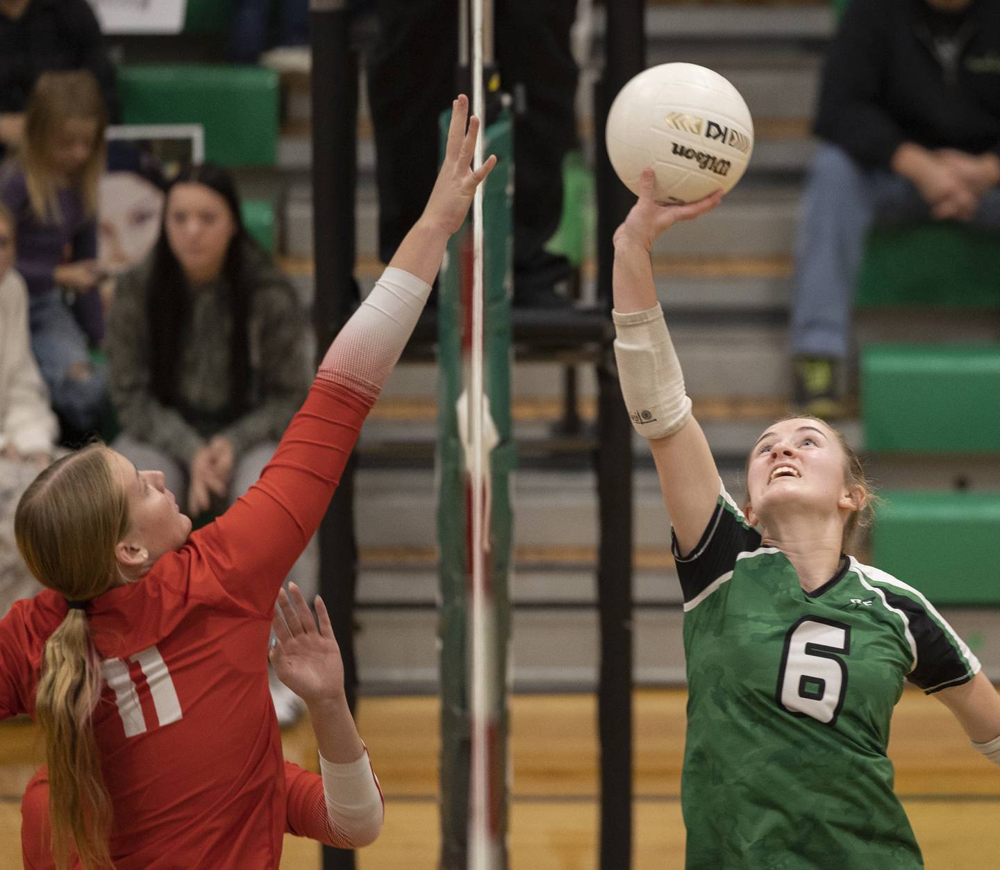 Rock Falls' Miley Bickett works against Oregon’s Izzy Berg  Wednesday, Oct. 22, 2025.