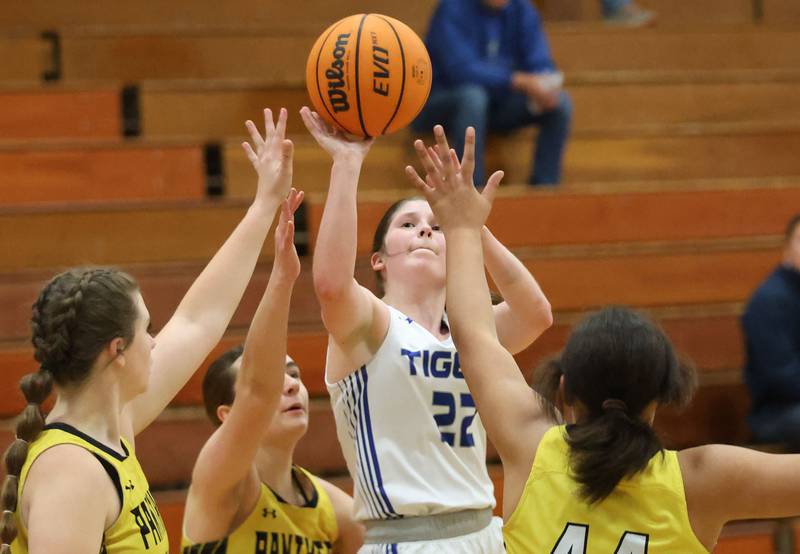 Princeton's Camryn Driscoll, eyes a shot over Putnam County's Cadence Breckenridge, Sofia Borri and Kaylynn Hill during the Tiger Girls Basketball Holiday Tournament on Tuesday, Nov. 18, 2025 at Princeton High School.