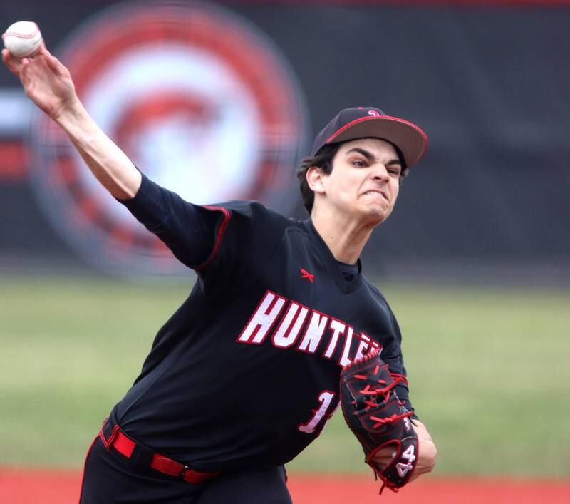 Huntley’s Mason Leske delivers in varsity baseball at Barrington Saturday.