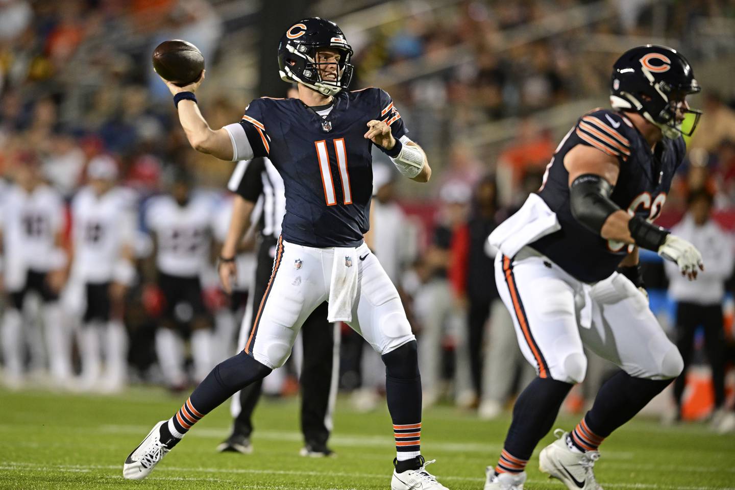 Chicago Bears quarterback Brett Rypien (11) throws a touchdown pass during the second half of an NFL exhibition Hall of Fame football game against the Houston Texans, Thursday, Aug. 1, 2024, in Canton, Ohio. (AP Photo/David Dermer)