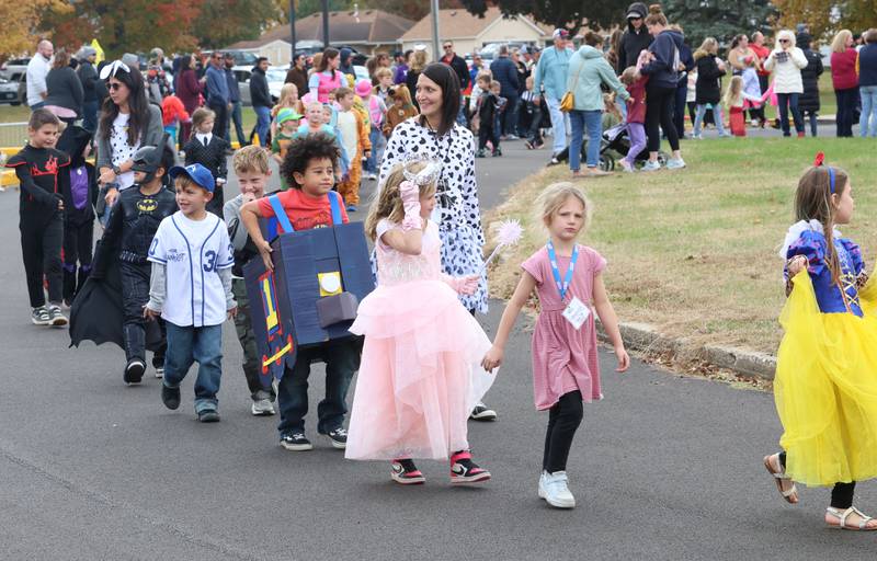 Students from Jefferson Elementary walk around the school during a Halloween parade on Friday, Oct. 31, 2025 in Princeton.