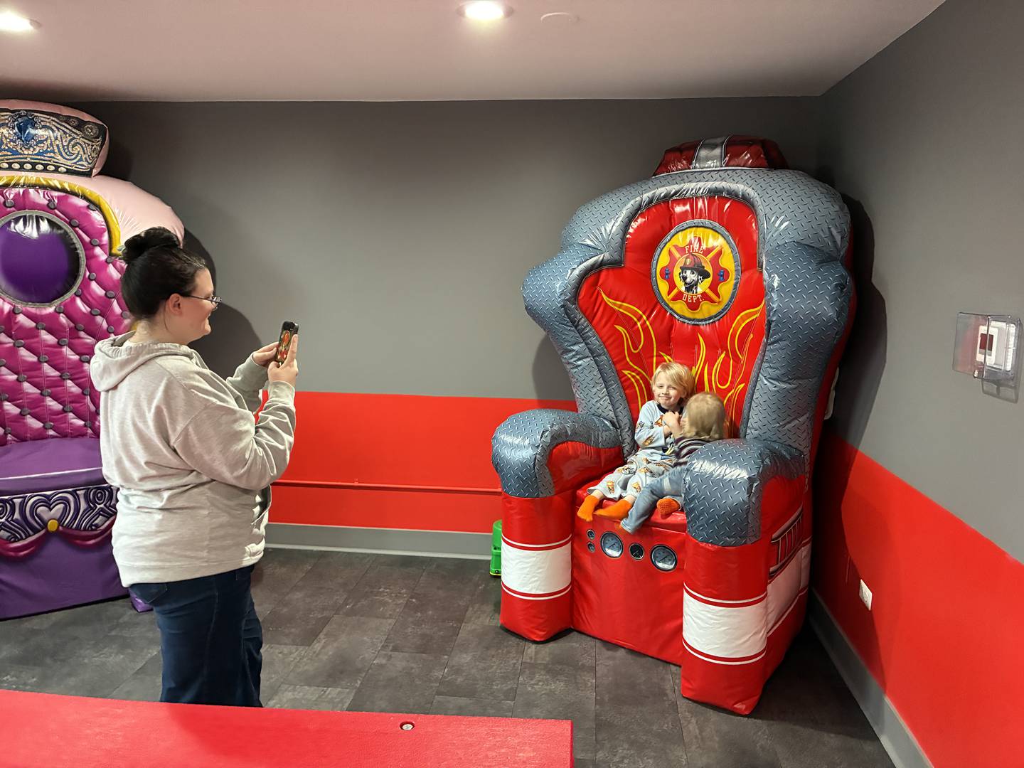 Jordyn Shaffer and her children at Kids Garage on Wednesday, Dec. 31, 2025. The bouncy house play area at 2309 N. Ringwood Road Unit GH, McHenry, opened in October.
