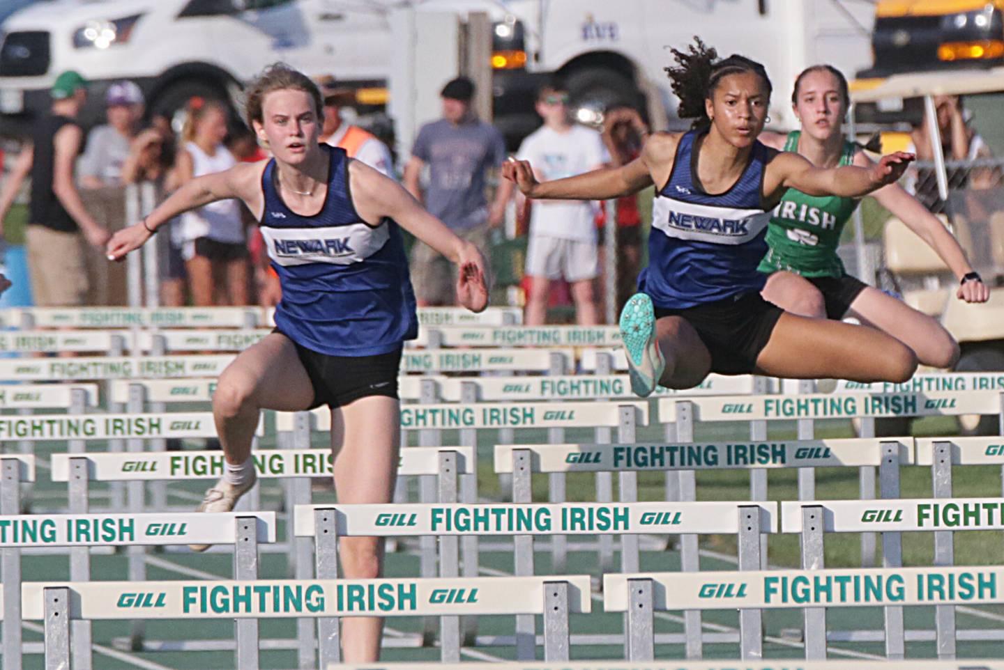 Newark's Megan Williams and Kiara Wesseh compete in the 100 meter hurdles in the Class 1A sectional girls track meet on Thursday, May 12, 2022 in Seneca.