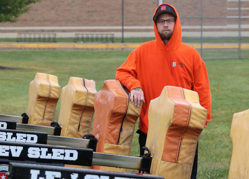 Matt Quinto, U.S. Navy veteran and DeKalb High School football coach, Tuesday, Sept. 24, 2024, on the practice field at DeKalb High School.