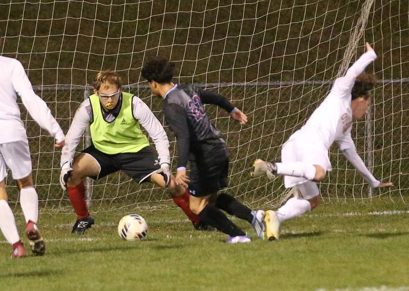 Kankakee's Dylan Tapia Ayala kicks the ball toward Ottawa keeper Laundry Brenbarger during the Class 2A Regional semifinal game on Monday, Oct. 20, 2025 at Ottawa HIgh School.
