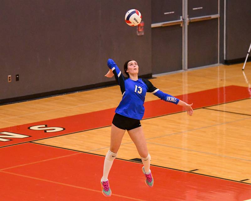 Geneva's Zoriana Malone (13) serves the ball while taking on Nazareth Academy on Thursday Nov. 6, 2025, during the during the sectional title game on Thursday Nov. 6, 2025, held at Timothy Christian High School.