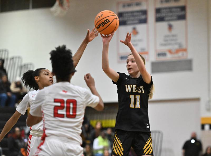 Joliet West's Samantha Casanova shoots a jump shot during the Joliet West regional semifinal game on Tuesday, Feb. 18, 2025, at Joliet.