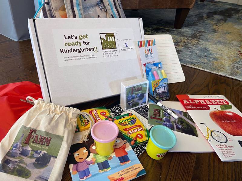 Each toolkit provides a young learner with a dry-erase board and marker, a book, crayons, scissors, a Farm Matching Game, play-doh, dice, and sidewalk chalk.