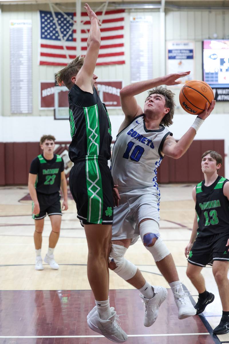 Clifton Central's Blake Chandler looks to shoot under pressure from Bishop McNamara's Coen Demack during the Fightin' Irish's 62-41 victory in the Watseka Holiday Tournament championship on Tuesday, Dec. 16, 2025.