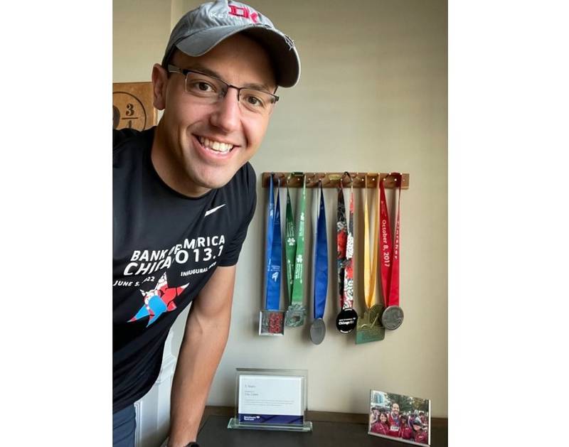 Cris Colon, 33, of Plainfield, a financial advisor with Merrill Lynch Wealth Management, has lost 100 pounds in the last seven years. Colon will run in the 44th annual Bank of America Chicago Marathon on Sunday, Oct. 9, 2022. This will be Colon's fourth marathon.