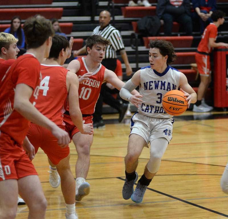 Sterling Newman's Garret Matznick (3) avoids Oregon's Keaton Salsbury (10) on Wednesday, Dec. 18, 2024 at the 63rd Annual Forreston Holiday Tournament.